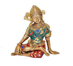 Sitting Indra brass idol, teal and red jewel-patterned attire, seated pose, 5.75 in