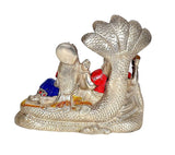 Brass SheshNaag base with seated Vishnu and Lakshmi, arched serpent hood and jeweled colors