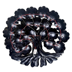 Black iron tree wall hanging with red LED wiring and flower-shaped leaf panels