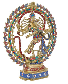 Brass Natraj idol in side view with beaded arch and multicolor gemstone detailing