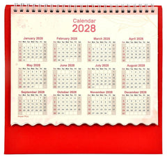 Desk standing calendar page showing 2028 monthly date grids across the top