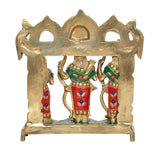 Brass Ram Darbar shrine, back view of two side figures flanking central deity in red