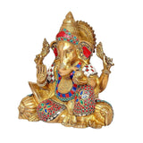 Brass Ganesha statue with colorful stone inlays, detailed face and folded hands