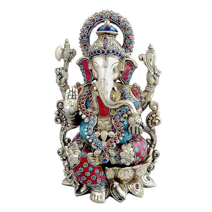 Brass Ganesha statue with carved dhoti, jeweled halo and four arms, 12.9 in
