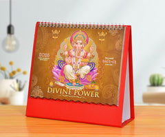 AONA Table calendar 2026 standing, red cover with “Divine Power” and Ganesha artwork