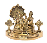 Golden brass Maa Lakshmi and Lord Vishnu seated on Sheshnag, front view on base