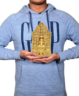 Brass Mahavir Swami statue figurine held in hands, compact 9 inch size