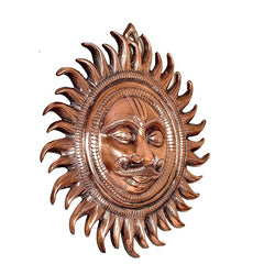 Metal sun statue with smiling embossed face, halo details, copper-brown finish