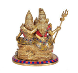 Brass Shiv Parivar statue rear view, ornate dresses and trident figures on base