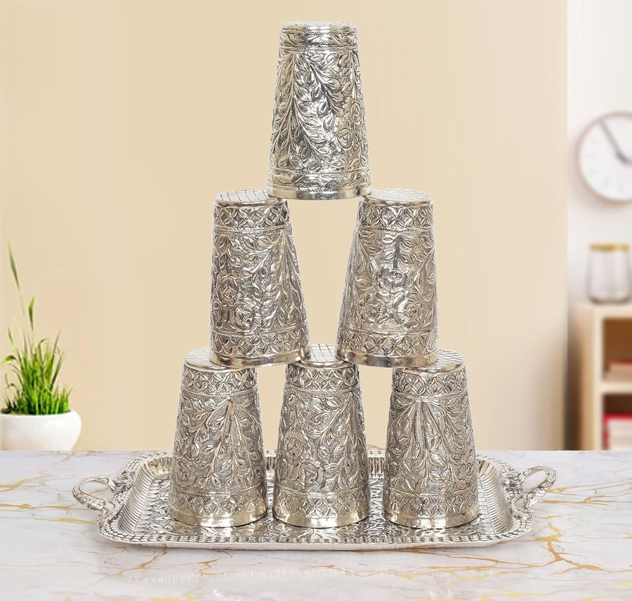 German-silver set: six embossed cups on matching tray with floral relief