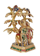 Side view brass Radha-Krishna idol with cow under tree, intricate painted motifs