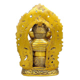 Back view of Ganesha brass sitting idol with decorative arched frame, antique finish