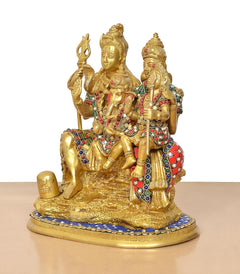 Brass Shiv Parivar idol, close side view, trident figure and two holding ornaments