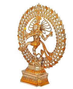 Brass Lord Shiva Nataraj idol from side view, dancing with ornate arch halo ring