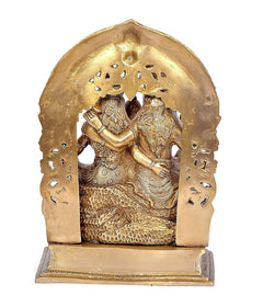 Brass Shiv Parivar idol back view: sculpted arch with textured figures