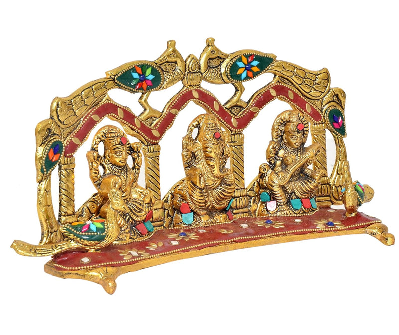 Metal Laxmi Ganesh Saraswati Idol with peacock frame (Height: 6 Inch)