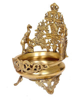 Brass urli bowl with detailed standing deity and curved rim; side view of base