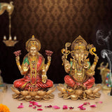 Resin Lakshmi and Ganesh sitting on lotus, multicolored detailing, ornate crowns