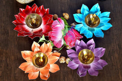 Metal lotus akhand diya (6-inch); brass flames on red, blue, orange and purple petals