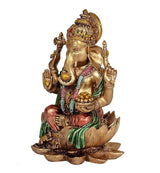 Ganesha resin murti, colorful adornments and raised hands, seated on lotus petals