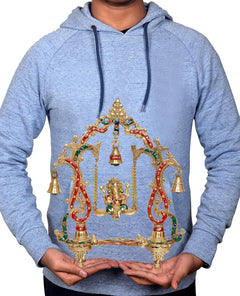 Brass Ganesha swing decorative showpiece with colorful detailing, held in front