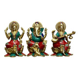Brass Lakshmi, Ganesha & Saraswati idol trio with red and teal outfits, 9-inch tall