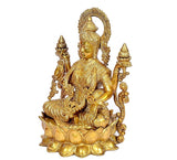 Brass Lakshmi Maa statue side view, four arms with ornate crown and halo