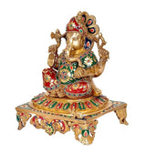 Brass Lord Ganesha idol statue side view, jeweled garments and decorated base