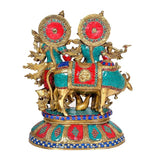 Krishna Radha brass showpiece riding cow, teal and red enamel with gold accents