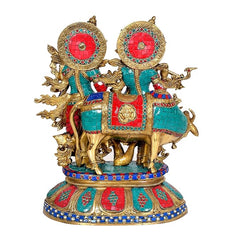 Krishna Radha brass showpiece riding cow, teal and red enamel with gold accents