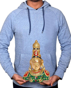 Parvati bust statue in hands, brass with green robe and red accents