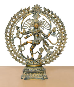 Front view of brass Natraj Lord Shiva dancing idol, crown and radiating halo detail