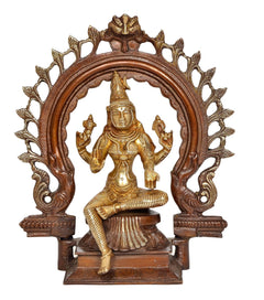 Brass Lakshmi idol statue, seated goddess under ornate arch with two side scrolls