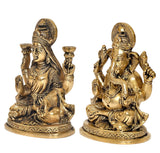 Brass Lakshmi and Ganesha idol set, side view, ornate facial and hand details