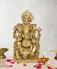 Gold Ganpati Ganesha idol statue, seated with ornate crown and multiple arms