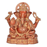 Brass Ganesh statue, front view, trunk forward, raised hands and patterned pedestal