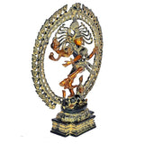 Brass Nataraja Shiva showpiece, angled view of dancing form inside circular arch