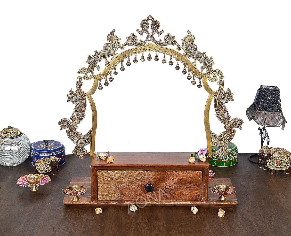 Brass-framed mandir with arched jali top and wooden base drawer, 20.5 in