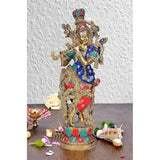 Krishna idol, 14-inch brass figurine with painted blue, red and green details