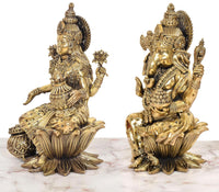 Two-sided view: Lakshmi and Ganesh seated brass-finish statues with detailed halos