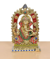 Brass Ganpati Bappa murti with decorative halo and multicolour jeweled attire, front