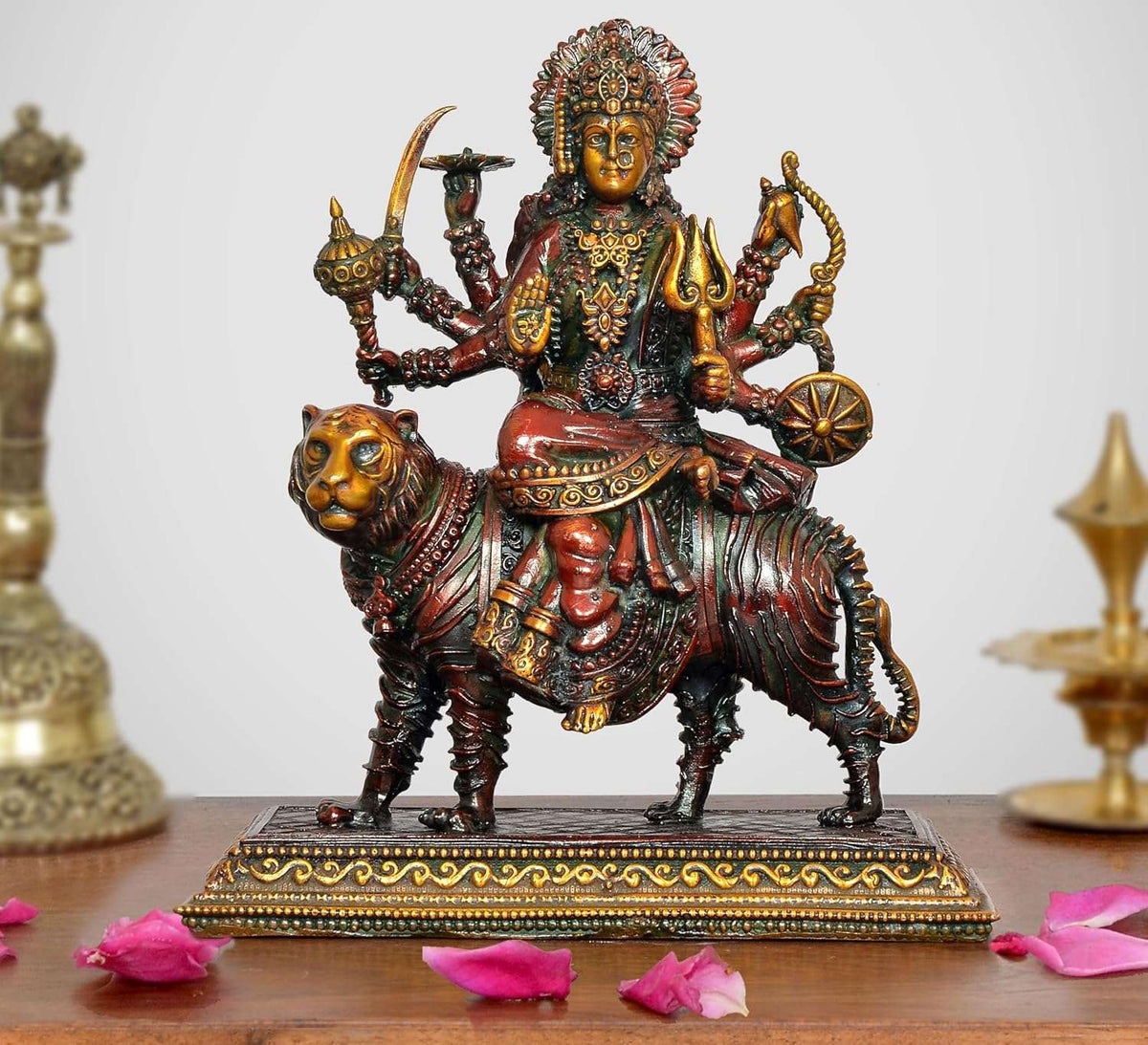 Superfine brass Durga Maa idol riding a tiger, detailed multicolor crown and arms