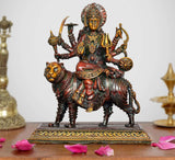 Superfine brass Durga Maa idol riding a tiger, detailed multicolor crown and arms