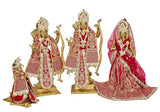 Ram Darbar brass statues: central seated figure with red dress, side standing figures, eye-work
