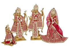 Ram Darbar brass statues: central seated figure with red dress, side standing figures, eye-work