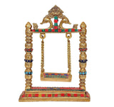 Brass swing jhula with ornate top arch and multicolor trim pillars for Ladoo Gopal