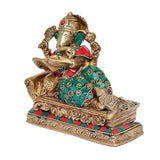 Ganpati Ganesha brass idol statue resting with a book, teal dress and red sash