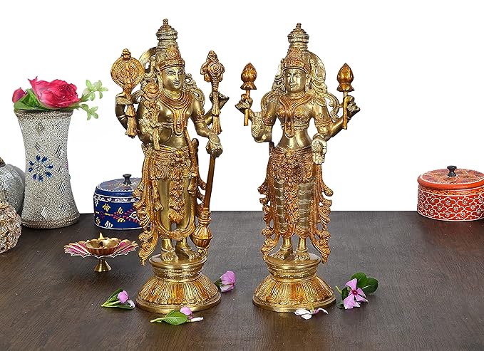 Gold-tone Vishnu Lakshmi idol statue, twin figure with raised hands, on pedestal