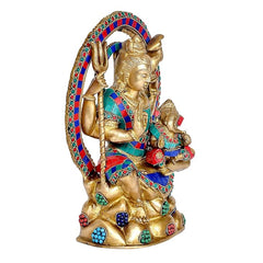 Brass Shiva statue holding trident, Ganesha on lap, multicolor halo border