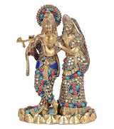 AONA Brass Radha Krishna idol, Radha holding a flute, ornate jeweled attire.